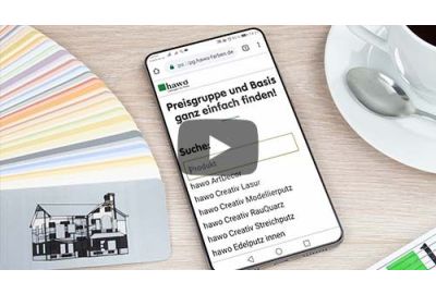 hawo Farbtonkarte, Handy und Kaffeetasse auf Tisch