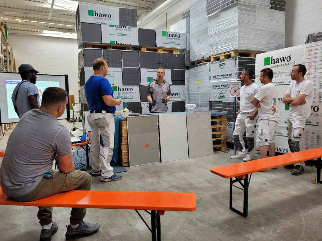 Seminarteilnehmer mit Seminarleiter